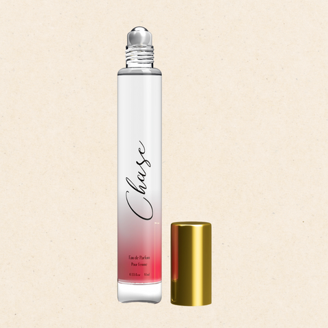 "Chase Eau De Parfum Rollerball by Regal Fragrances – a 10ml sleek rollerball bottle with a vibrant blend of pomegranate, yuzu, peony, and lotus, delivering a fresh, floral fragrance with a warm musk and amber finish, perfect for on-the-go use."