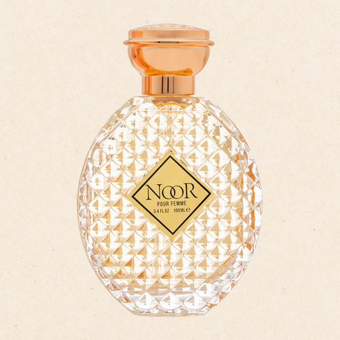 "Noor Women's Perfume by Regal Fragrances – a captivating floral fragrance inspired by Chanel's Gabrielle, featuring notes of fresh mandarin, grapefruit, and black currant. Perfect for any occasion, this scent offers long-lasting sophistication and is elegantly packaged."