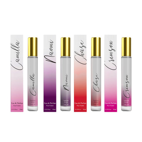 A set of four Eau De Parfum rollerballs in different fragrances, each with a unique color label and gold-accented cap. Perfume Gift Set